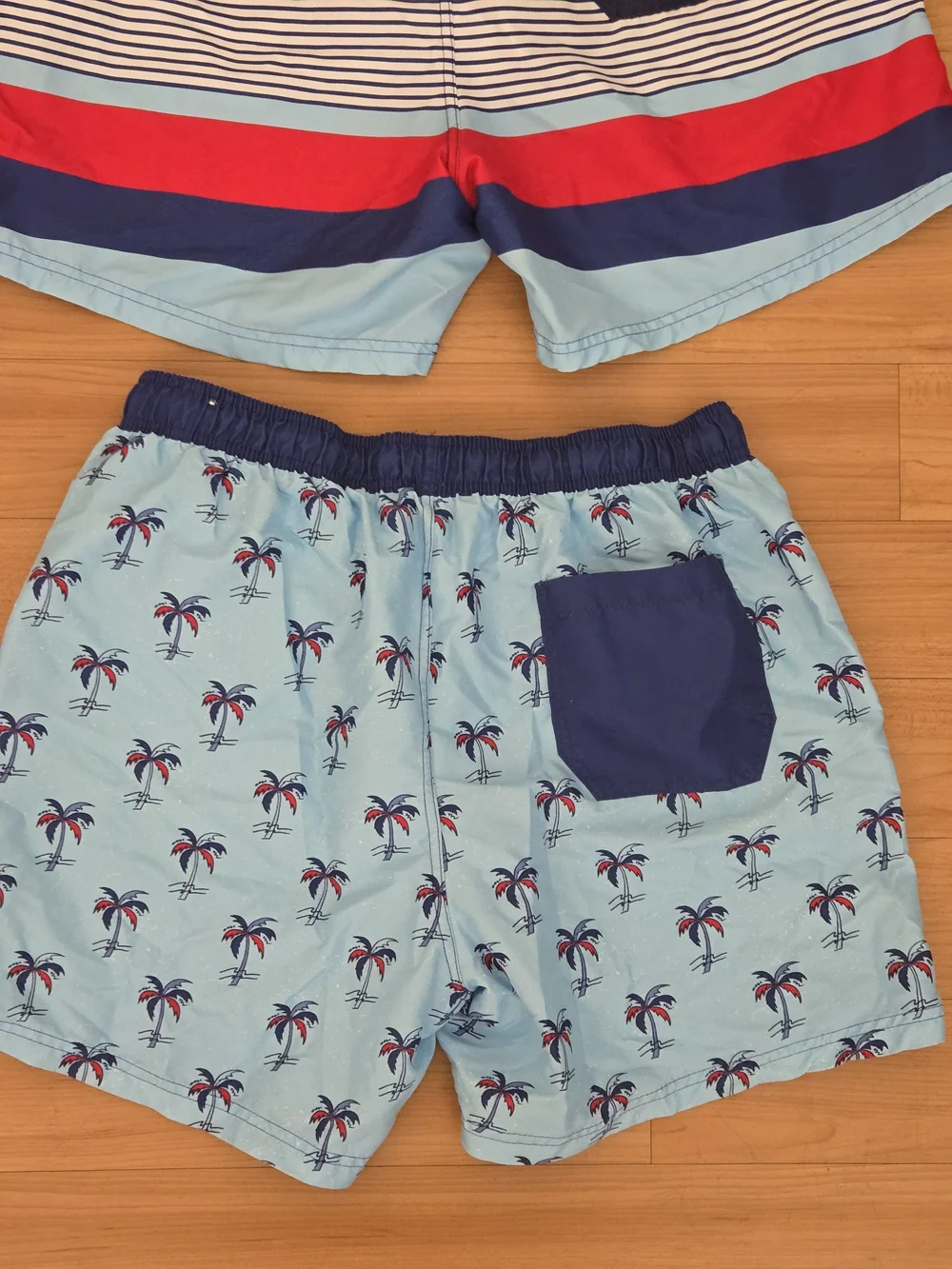 2 Pairs Boys Large Light Blue Palm Print Swim Shorts with Navy & Red Accents